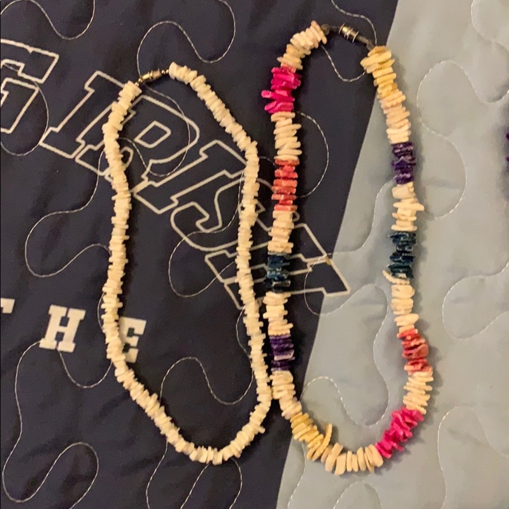 Several colors shell necklaces and bracelets.